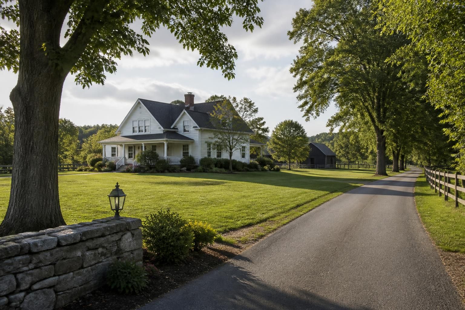 Rural residential property with mature trees and a quiet road